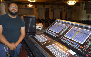 Warner Grand Theatre Master Electrician and FOH Engineer Victor Prudeaux at the venue’s new DiGiCo SD12 console
